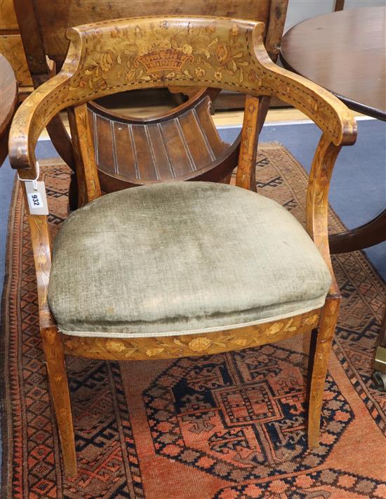 A 19th century Dutch floral marquetry inlaid tub framed elbow chair